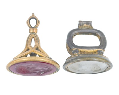 Lot 1091 - Two Georgian fob seals with large Tassie-style glass oval bust portrait intaglios.