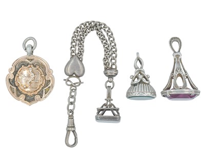 Lot 1099 - A selection of four silver fobs.