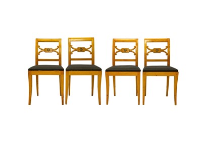 Lot 979 - A set of four Biedermeier style dining chairs.