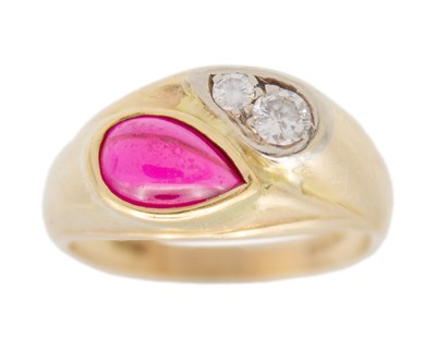 Lot 234 - A 14k gold synthetic ruby and diamond crossover dress ring.