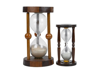 Lot 36 - Two small glass domes.