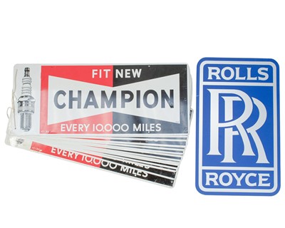 Lot 16 - A group of 14 Champion spark plug tin advertising signs.