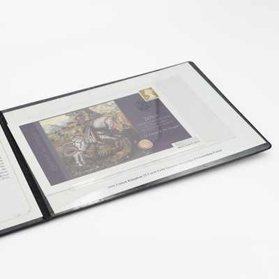 Lot 164 - A Westminster Mint presentation cover 2010 quarter sovereign gold proof coin.