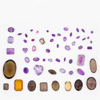 Lot 79 - A collection of loose quartz gemstones.
