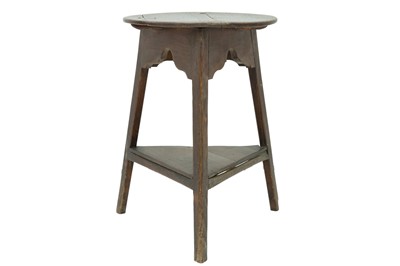 Lot 684 - An ash and elm circular cricket table.