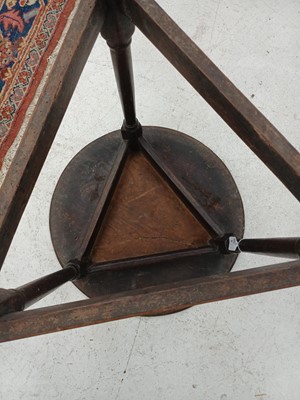 Lot 666 - An elm and oak circular cricket table.