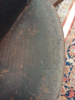 Lot 666 - An elm and oak circular cricket table.