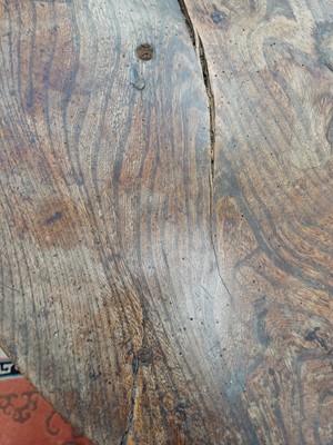 Lot 666 - An elm and oak circular cricket table.