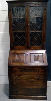 Lot 64 - A Mid-century Oak Bureau Bookcase. The height...