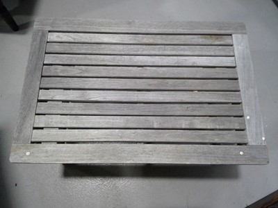 Lot 60 - A Hardwood Garden Table. The Table is 38cm...