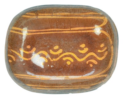 Lot 625 - A slipware pottery dish.