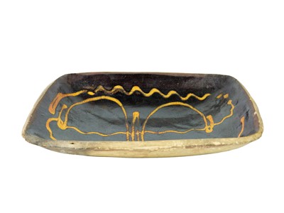Lot 612 - A slipware rectangular dish.