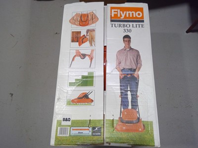 Lot 39 - A Flymo Turbolite 330 Lawnmower. The Lawnmower...