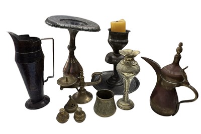 Lot 69 - Two unusual arts & crafts style copper candle...