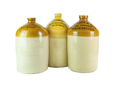 Lot 676 - Local interest. Wadebridge and Bodmin stoneware flagons.