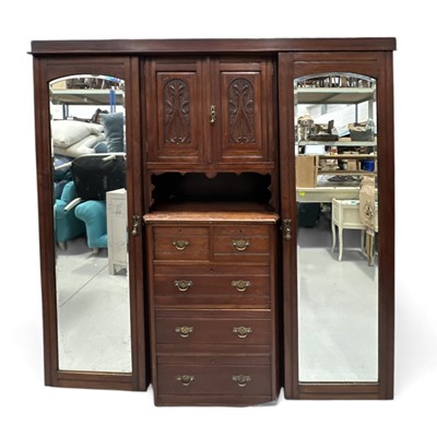 Lot 10 - An Edwardian Mahogany Wardrobe. The Wardrobe...