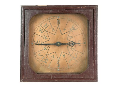 Lot 63 - A copper compass.