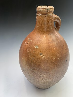 Lot 1 - A German Stoneware jar. Height 40.5cm.