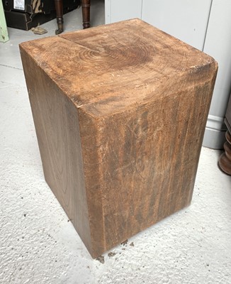 Lot 29 - A square chunk of chestnut timber. Height 44cm,...