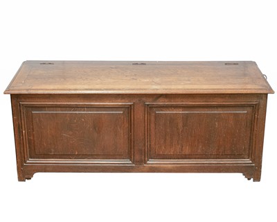 Lot 716 - An oak panel coffer.