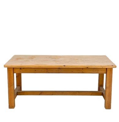 Lot 944 - A pine refectory table with two drawers on square supports.