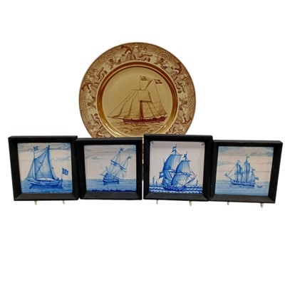 Lot 118 - Four Delft-style framed wall tiles 14cm square,...