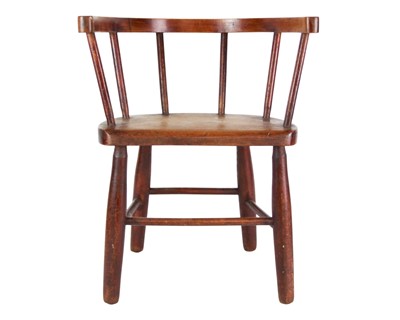 Lot 957 - A beech and ash child's stick back chair.