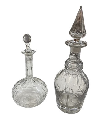 Lot 132 - Two cut glass decanters, both with stoppers.