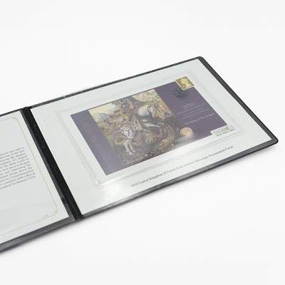 Lot 165 - A Westminster Mint presentation cover 2010 quarter sovereign gold proof coin.