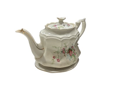 Lot 141 - An English 'Worcester' teapot with stand,...