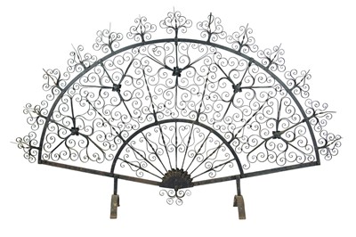 Lot 204 - An ornate wrought iron fire screen, attributed to Archibald Carne of Truro.