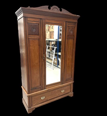 Lot 168 - An Edwardian Mahogany Wardrobe. The Wardrobe...