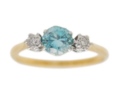 Lot 280 - An 18k gold blue zircon and diamond ring.