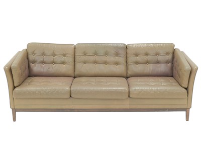 Lot 654 - A Danish leather three seater settee.
