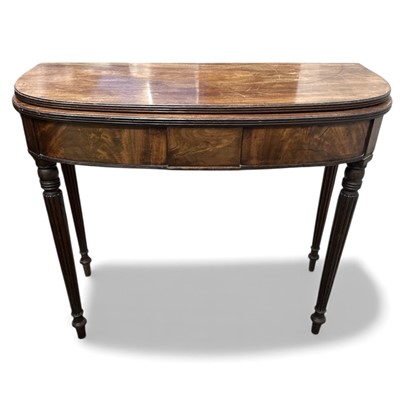 Lot 7 - A Regency-style mahogany fold out tea table,...
