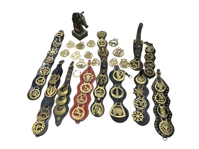 Lot 202 - A quantity of horse brasses, along with a...