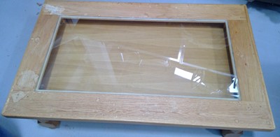 Lot 17 - An Ash Coffee Table with a Hinged Glass Top....