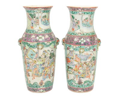 Lot 397 - A pair of Cantonese famille rose vases.