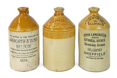 Lot 668 - Three stoneware flagons.