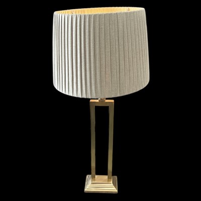 Lot 44 - An OKA brass table lamp, 76cm overall height.