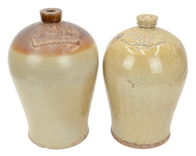 Lot 693 - Two slab seal stoneware flagons.