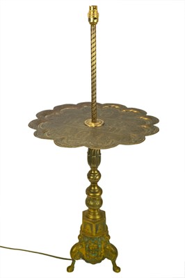 Lot 38 - A brass side table with integrated lamp.