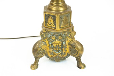 Lot 38 - A brass side table with integrated lamp.