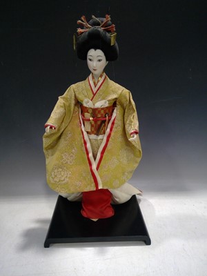 Lot 8 - A Vintage Japanese Geisha Doll. The Doll is...