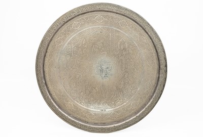 Lot 381 - A finely engraved Persian circular silver tray.
