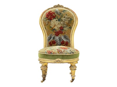 Lot 978 - A Victorian giltwood nursing chair.