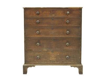 Lot 685 - A tall oak chest.
