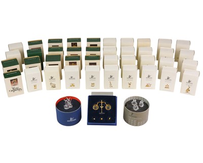 Lot 613 - A collection of Swarovski Crystal Memories miniatures.