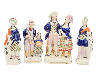 Lot 650 - Four Victorian Staffordshire chimney ornaments.