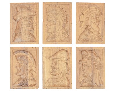 Lot 656 - A group of six carved oak panels.